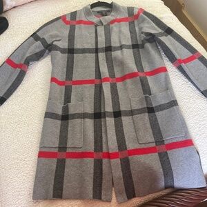 Thigh length sweater.